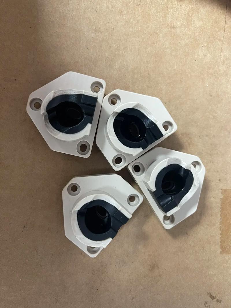 White and black two-shot molded production components